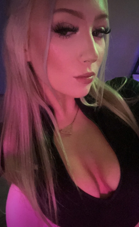 Slutty blondy babe Cil Xo teases with her giant boobs while posing in a solo - #260305