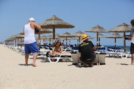 College skanks go bare-breasted during a game of beach volleyball - #230877