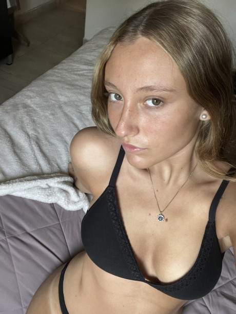 Teenie amateur Estell Aily unveils her meaty behind and covers her melons - #137655