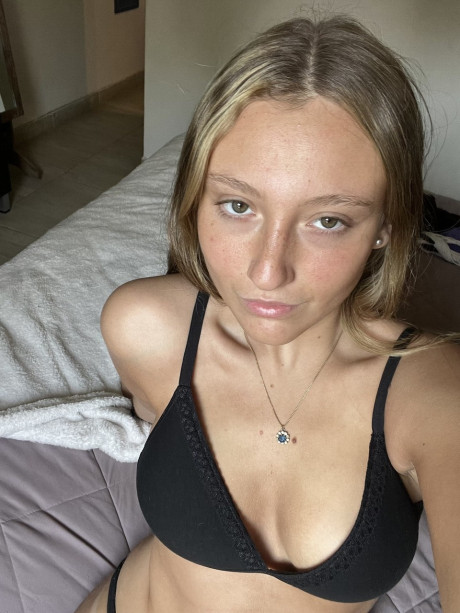 Teenie amateur Estell Aily unveils her meaty behind and covers her melons - #137658