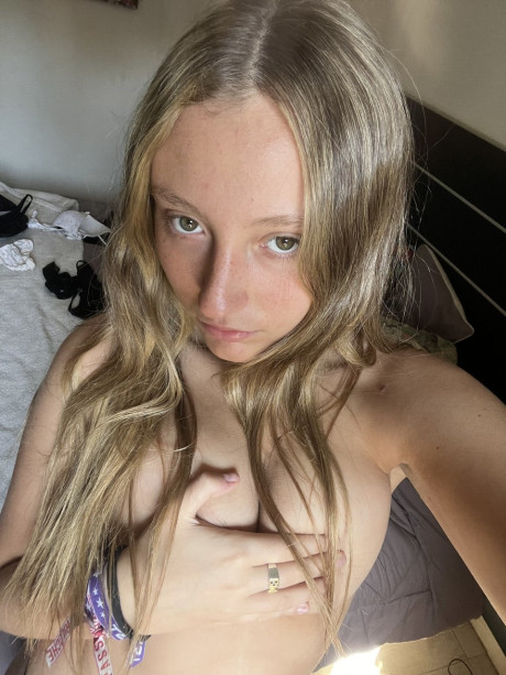 Teenie amateur Estell Aily unveils her meaty behind and covers her melons - #137665