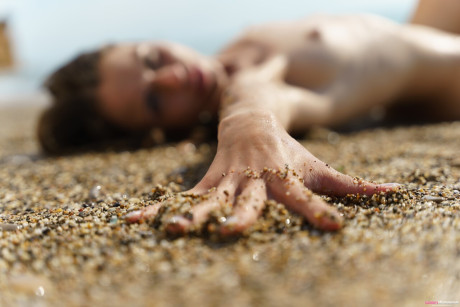 Charming teenie Sirena Milano shows her shaved snatch while fully naked at the beach - #217872