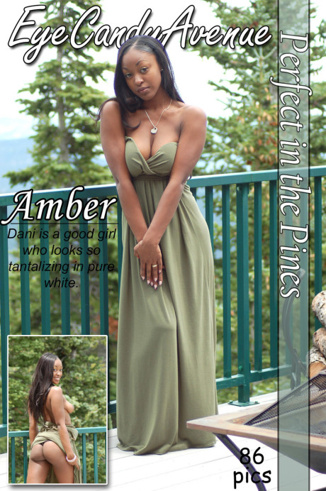 Ebony amateur Amber releases her giant boobies from a long dress on a balcony - #100196