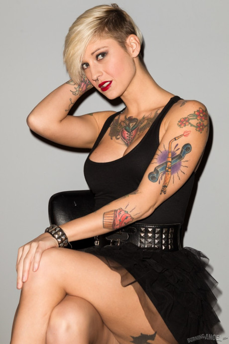 Tattooed female Kleio Valentien slips out of her ebony dress for undressed poses - #91135