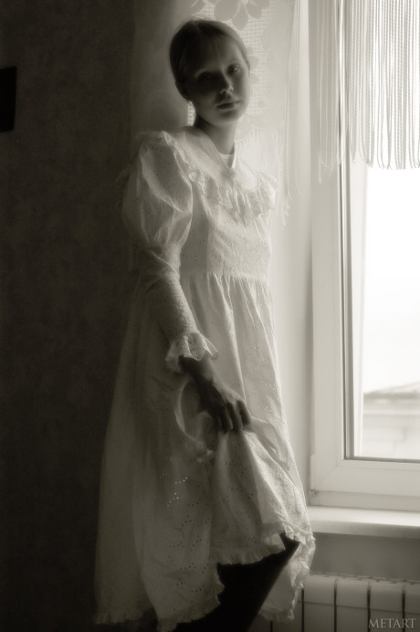 Pantyless babe shows her puffy nipples and cunt while posing by the window - #176174