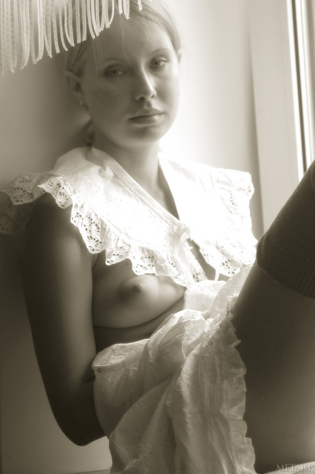 Pantyless babe shows her puffy nipples and cunt while posing by the window - #176188