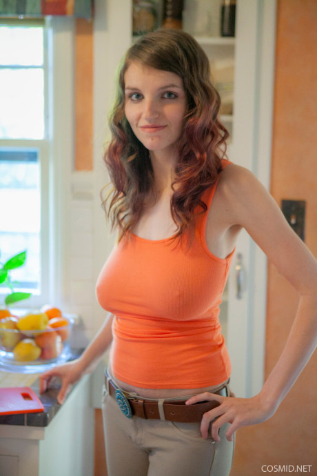Amateur model with massive tits pulling down her shirt to let them hang - #177076