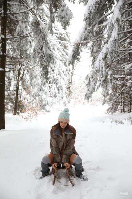 Slender glamorous babe Clover teasing nude outdoors in the snow - #80041
