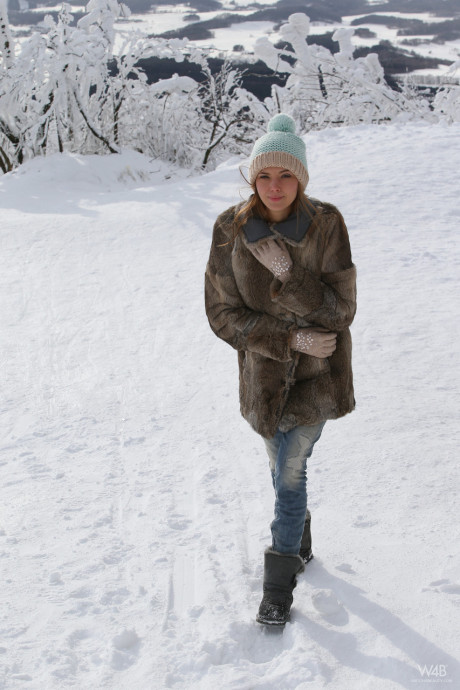 Slender glamorous babe Clover teasing nude outdoors in the snow - #80050