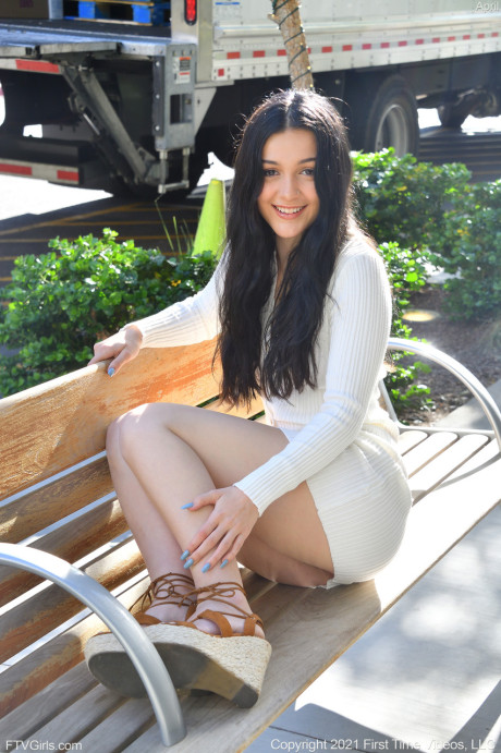 Lovely amateur babe April flashes her yummy twat on an outdoor bench - #61038