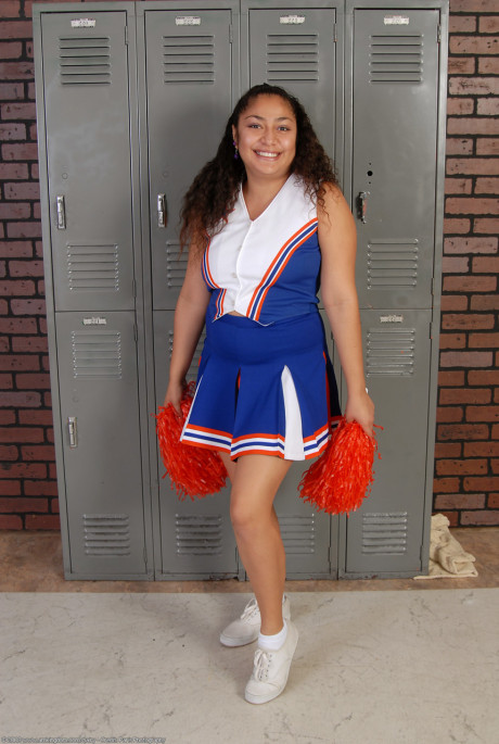 Thin curly haired cheerleader Reena shows her wide booty and bushy pussy - #70606