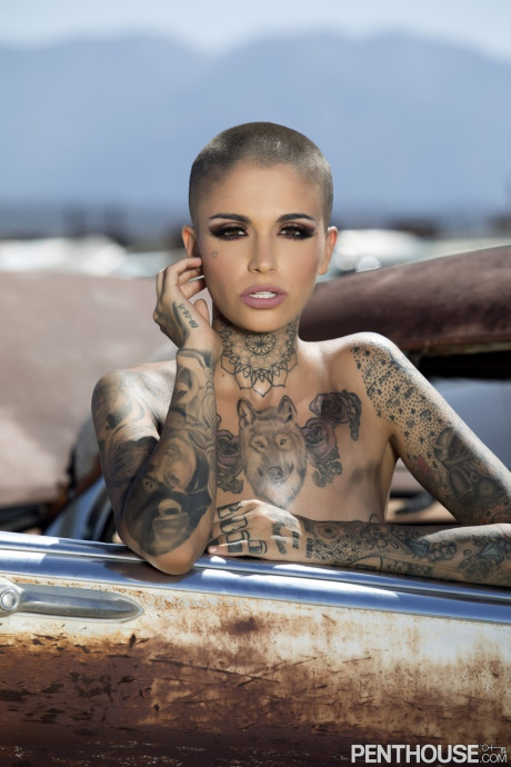 Bald inked babe Leigh Raven flaunts her small boobs and poses naked outdoors - #257917