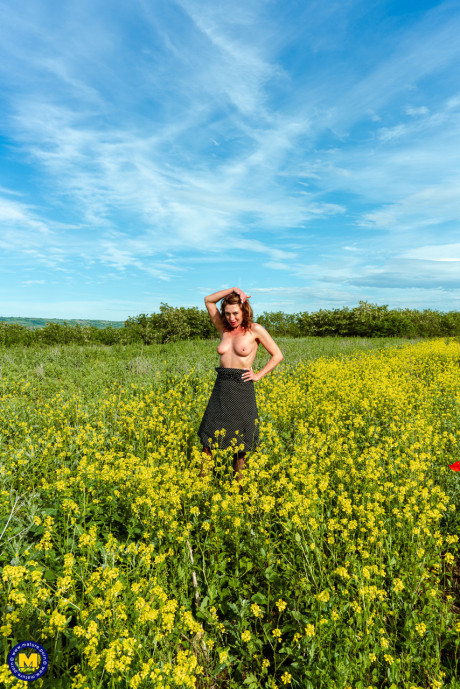 Ukrainian MILF Julia North shows off her natural titties & her huge behind outdoors - #136589