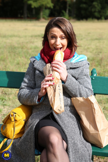 French mom Anya flashes her legs in nylons while eating a sandwich outside - #129512
