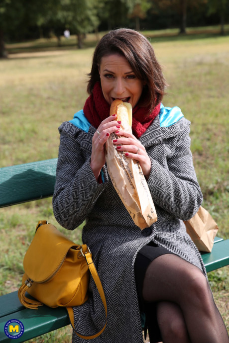 French mom Anya flashes her legs in nylons while eating a sandwich outside - #129514
