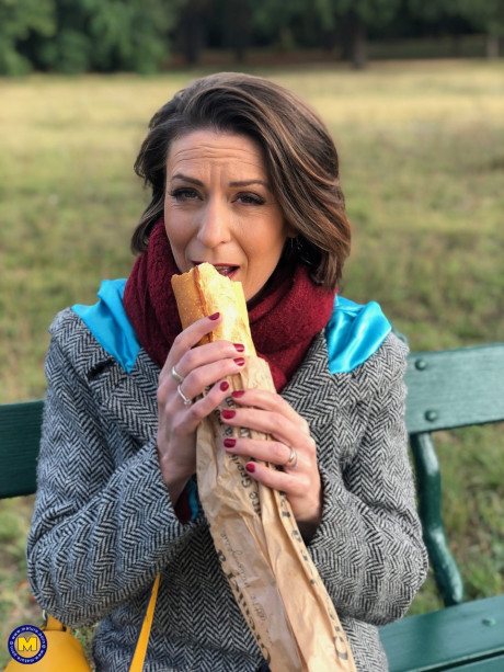 French mom Anya flashes her legs in nylons while eating a sandwich outside - #129522