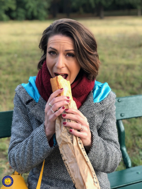 French mom Anya flashes her legs in nylons while eating a sandwich outside - #129523