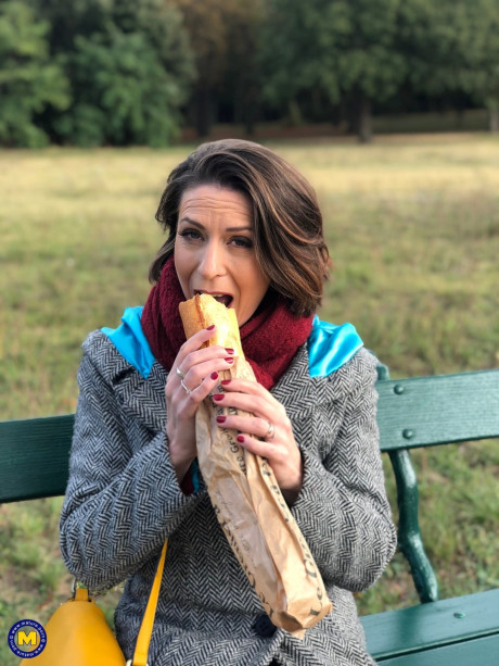 French mom Anya flashes her legs in nylons while eating a sandwich outside - #129524