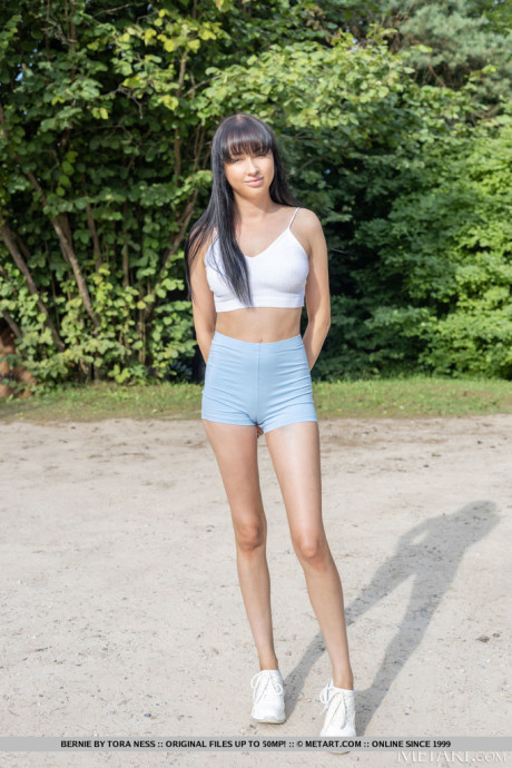 Dark-haired teenie strikes confident nude poses after removing athletic wear - #279353