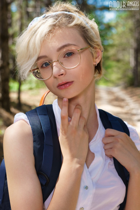 Fresh teen looking lady girlfriend lady Azshara strips off school clothes on a dirt road in woods - #133944