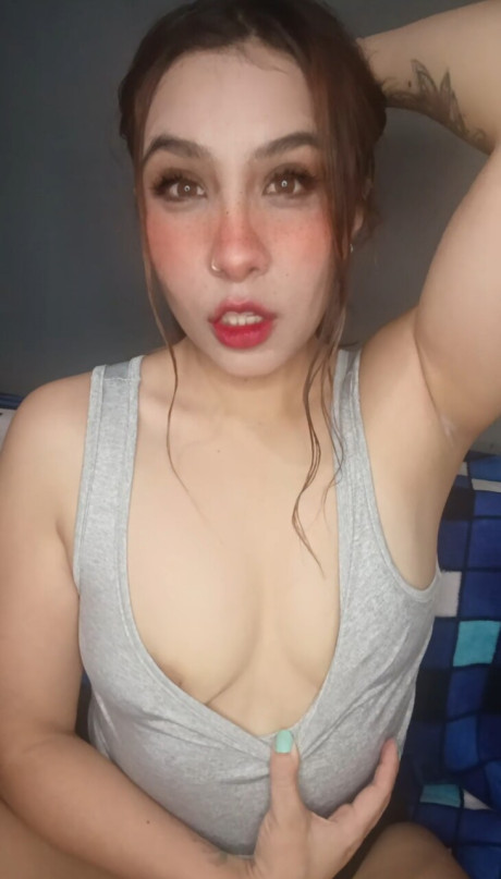 Brunette amateur Anya Amsel covers up her boobies after exposing them briefly - #282597