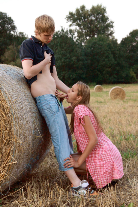 Fresh teenie couple Kitty Jane & Augustin have sex in a field against a round bale - #71019
