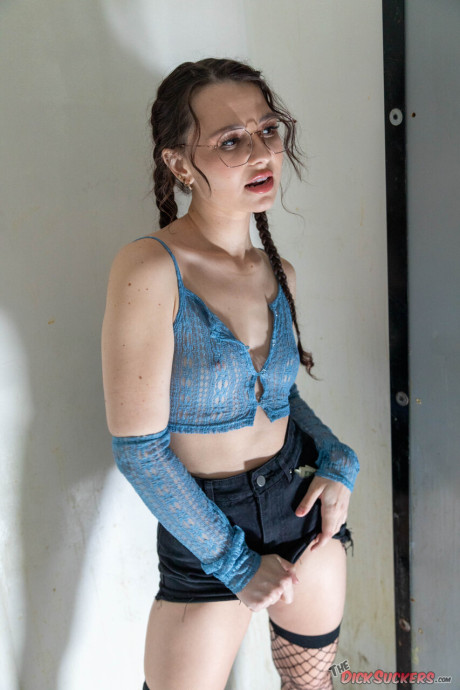 Liz Jordan wears her glasses while taking part in a blowbang at an adult store #16353