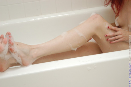 Redheaded babe Rose enjoys a hot bubble bath and plays with her coochie - #269668