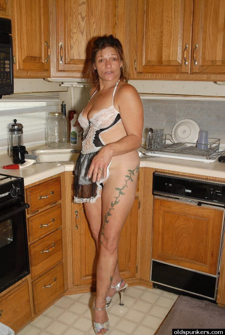 Experienced yellow-haired lady lady Ivee showing off thong adorned ass in kitchen - #118839