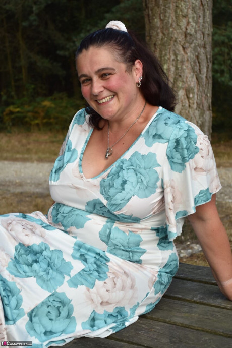 Old BBW removes a dress before uncovering her natural breasts in the woods - #294064