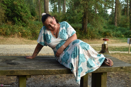 Old BBW removes a dress before uncovering her natural breasts in the woods - #294067