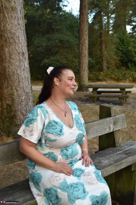 Old BBW removes a dress before uncovering her natural breasts in the woods - #294072