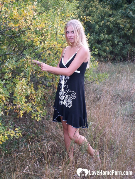 Naughty yellow-haired strips undressed & shows off her tanned breasts outdoors - #224913