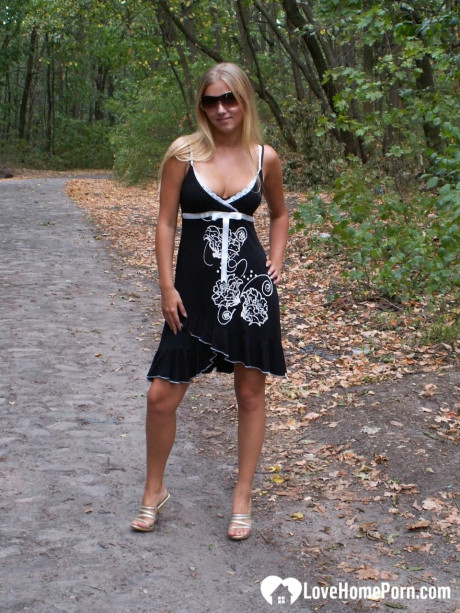 Naughty yellow-haired strips undressed & shows off her tanned breasts outdoors - #224919