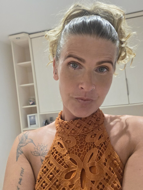 Solo bitch GF broad shows off her tattoos while taking selfies in a halter dress - #294538
