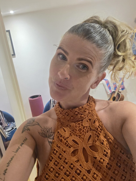 Solo bitch GF broad shows off her tattoos while taking selfies in a halter dress - #294540