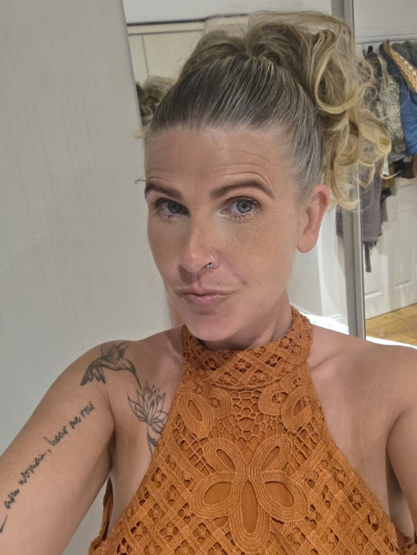 Solo bitch GF broad shows off her tattoos while taking selfies in a halter dress - #294542
