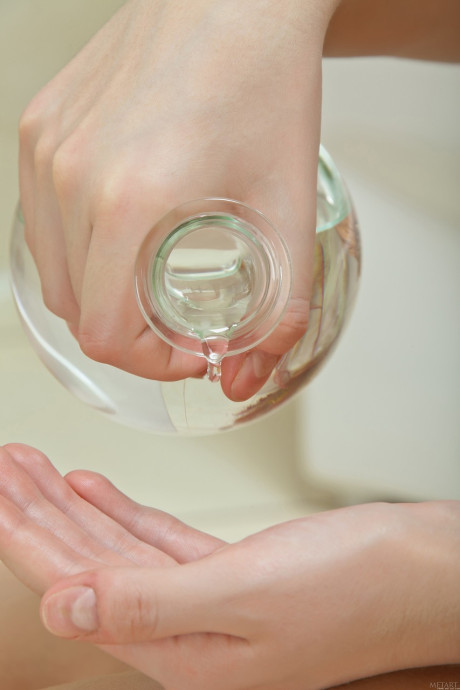 Teenie babe Sabina B oils up her puffy nipples & her cute body in the bathroom - #202135