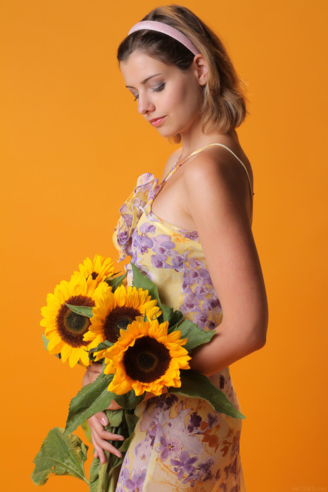 Sexy young sweetie Vienna flaunts her monstrous breasts and poses with sunflowers - #292487
