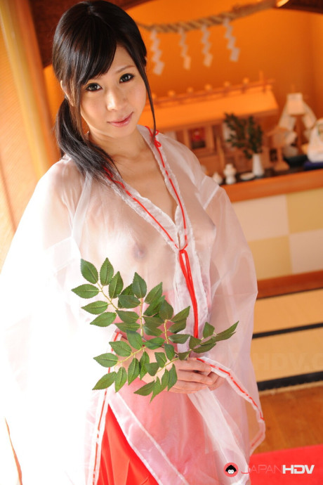 Japanese girl gf lady Yume Sorano holds a branch while showing her natural boobs - #269640