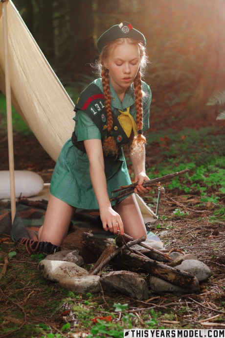 Redheaded girl girl broad Scout Dolly Little gets nude outside her tent in beret - #145193