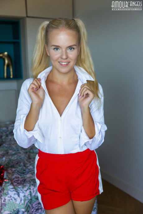 Adorable yellow-haired teen Decima holds pom-poms while getting naked - #279668