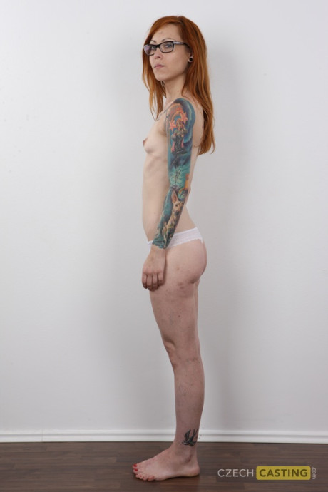 Tattooed ginger head removes her dress to pose undressed with her glasses on - #301148