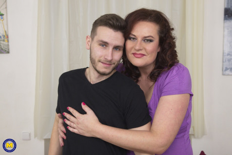 Chunky old whore chick seduces her younger stud in ebony skirt and hose - #292414