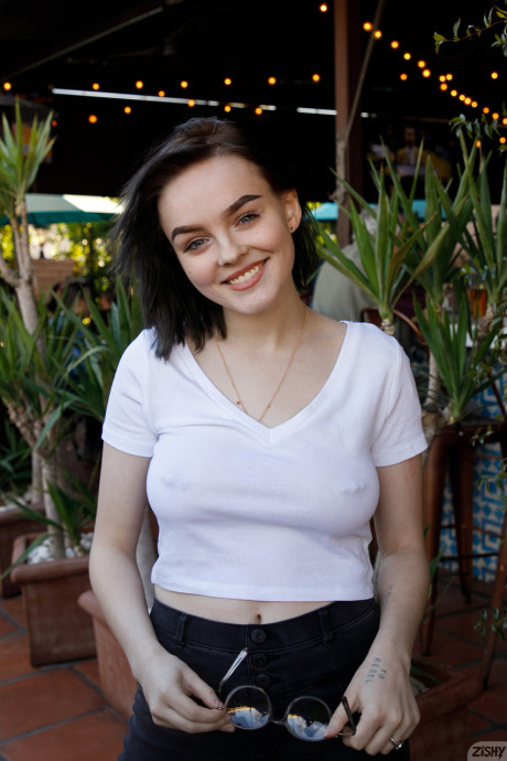 Brunette teenie Vonnie Bean teases with her large juggs in a full tub - #117626
