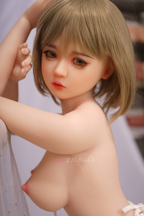 Sex doll with striking eyes and perky breasts gets naked on her knees - #278441