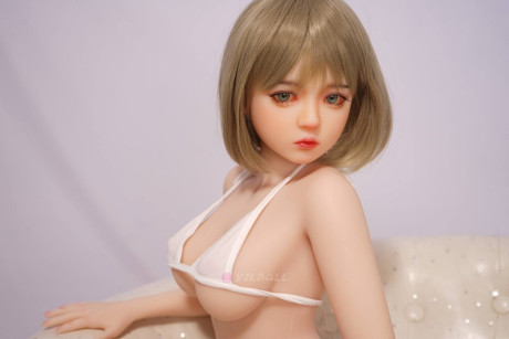 Sex doll with striking eyes and perky breasts gets naked on her knees - #278447
