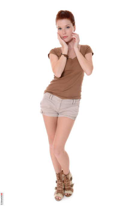 Attractive ginger head Mia Sollis does a slow striptease before crossing her long legs - #298660