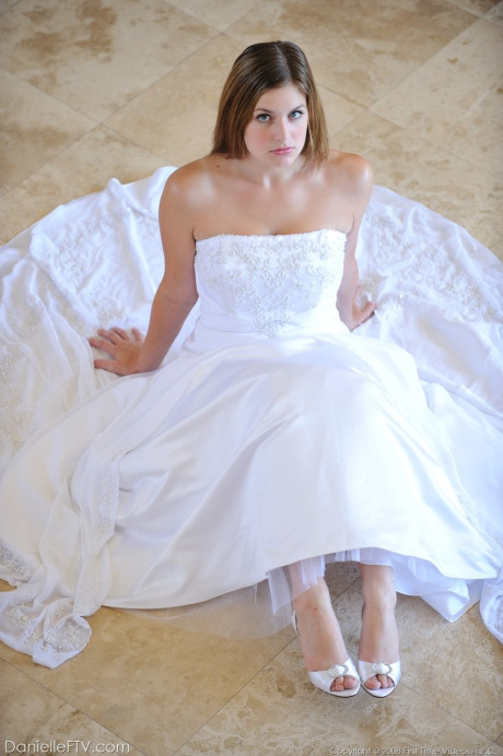Busty glamorous amateur Danielle models wedding gown indoors & by the pool - #218939