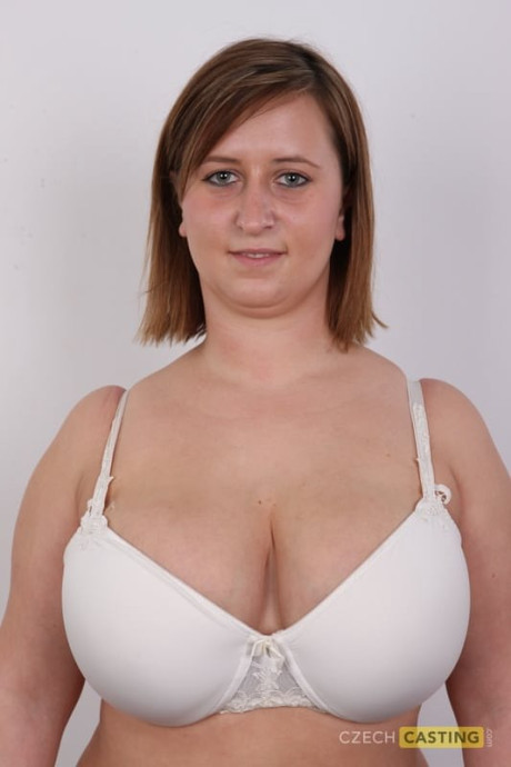 Thick mature amateur gets completely undressed in front of a white wall - #321573